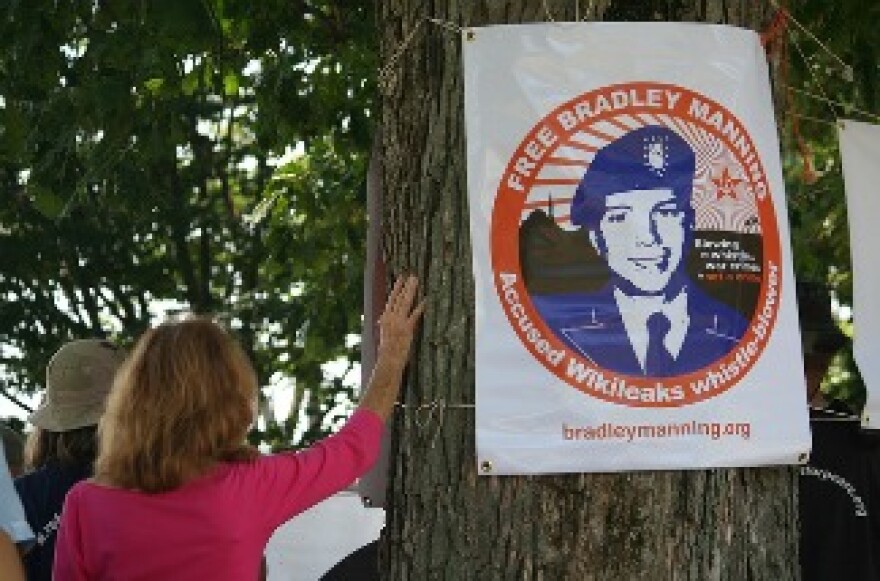 A homemade sign protesting the Army's accusations against Pfc. Bradley Manning.