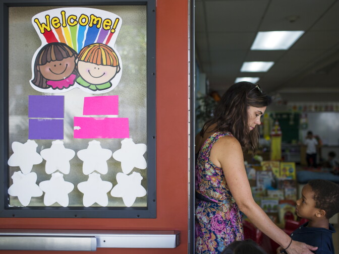 Teacher Cherie Wood helps her kindergarteners during morning recess at Willard Elementary School in Pasadena, two weeks into the school year, on Wednesday, Aug. 31, 2016.