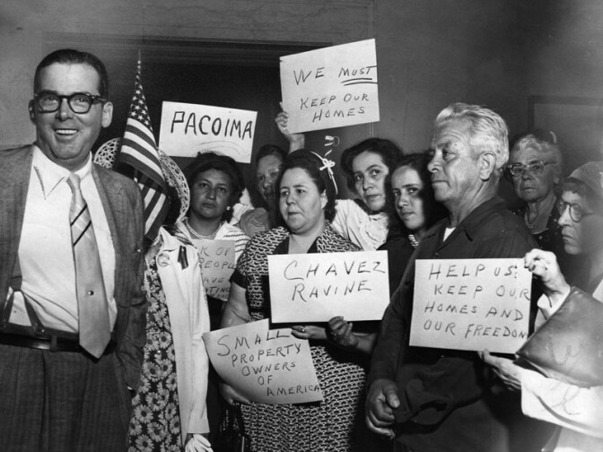 July 20, 1953: "Home owners from Chavez Ravine, Rose Hills and Pacoima tell Mayor Norris Poulson (left) to fight on for abandonment of housing projects." Courtesy of the Los Angeles Public Library
