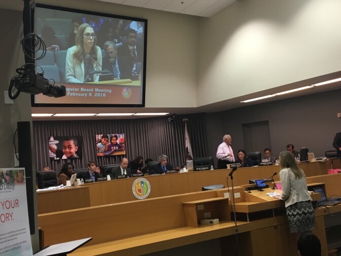 FILE - Cassy Horton, a director of regional advocacy for the California Charter Schools Association, testifies in support of a charter application at a Los Angeles Unified school board meeting in Feb. 2016.