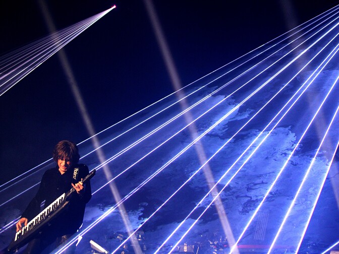 French composer Jean Michel Jarre performs on stage on December 1, 2010 in Epernay, eastern France. AFP PHOTO / FRANCOIS NASCIMBENI (Photo credit should read FRANCOIS NASCIMBENI/AFP/Getty Images)
