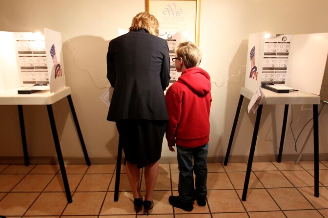 Los Angeles City Controller Wendy Greuel votes with her son Thomas by her side in the Los Angeles mayoral primary on March 5, 2013 in Los Angeles.