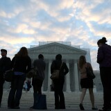 WASHINGTON, DC - OCTOBER 10:  People wait in line to enter the U.S. Supreme Court on October 10, 2012 in Washington, DC. Today the high court is scheduled to hear arguments on Fisher V. University of Texas at Austin, and are tasked with ruling on whether the university's consideration of race in admissions is constitutional.  (Photo by Mark Wilson/Getty Images)