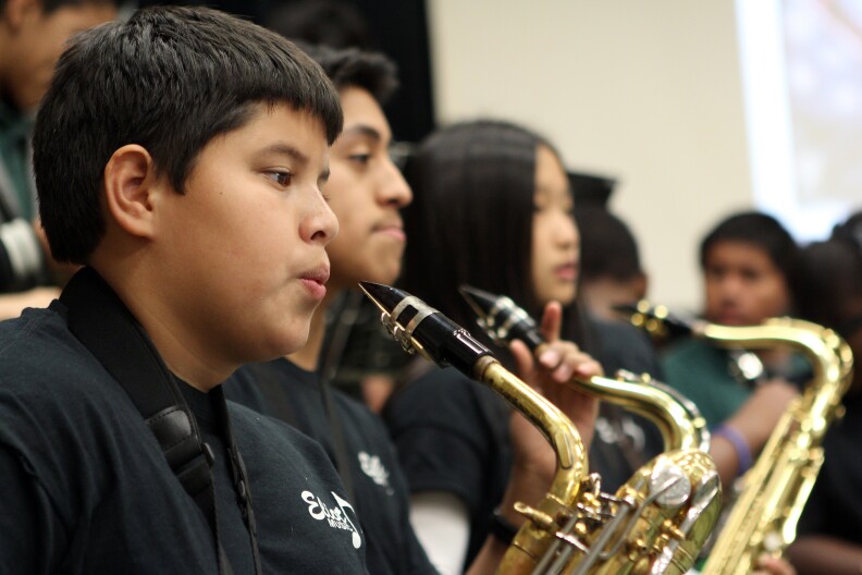 Eliot Middle School students perform as part of a field trip to recruit students to attend their school. Eliot has been informally renamed Eliot Arts to reflect the school's new arts focus. 