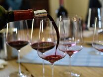 TO GO WITH AFP STORY BY ALEXANDRA LESIEUR
Wine is poured during a tasting of the 2016 vintage Bordeaux primeurs at Chateau La Lagune in Ludon-Medoc on April 4, 2017.
Professionals from all over the world, in Bordeaux this week to taste the 2016 vintage at Bordeaux's en primeur, agree that the 2016 vintage is "excellent" and expect grand cru wines at "reasonable" prices. / AFP PHOTO / GEORGES GOBET        (Photo credit should read GEORGES GOBET/AFP/Getty Images)
