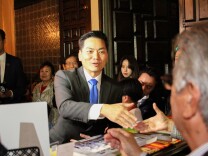 Robert Lee Ahn (D) arrives to an enthusiastic crowd, before the results are in, at La Fonda de Los Camperos on June 6, 2017, in Los Angeles, California for his election night event.