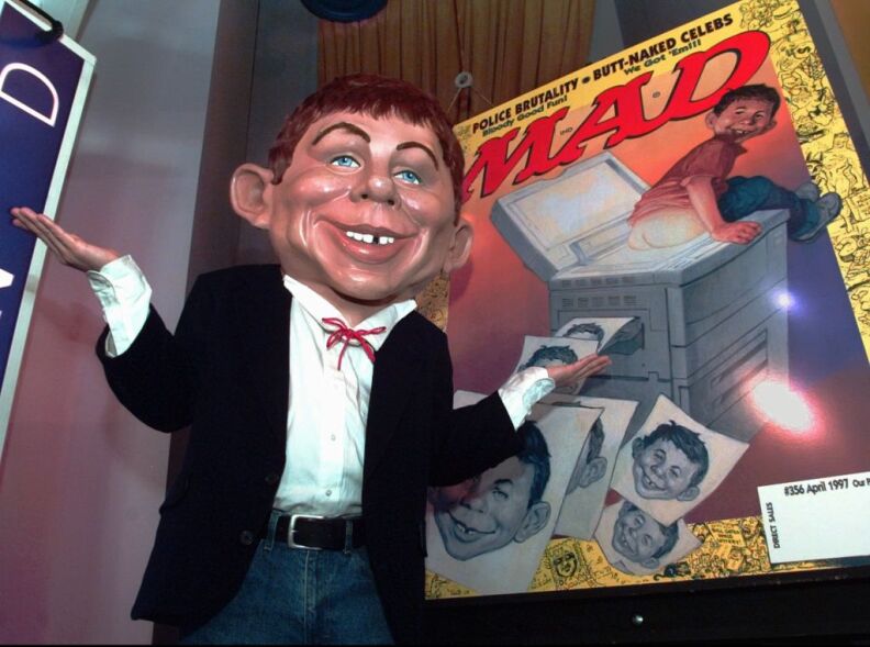 Mad Magazine mascot Alfred E. Neuman shows off the debut cover of the publication's new look at a New York news conference Tuesday, April 1, 1997.
