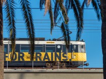 A test train runs above Pico Boulevard in Santa Monica along the new Expo Line extension on April 27, 2016.
