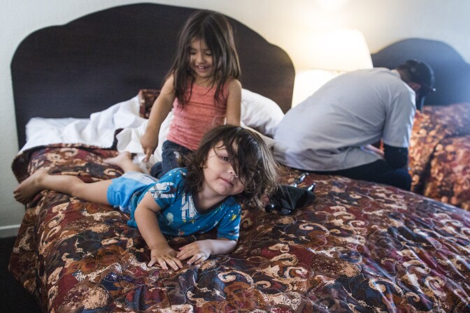 Two-year-old Elyiah Balam and four-year-old Jeniah Balam are living with their family at Golden Motel. The motel is going to be redeveloped as affordable housing with 169 units for veterans and formerly homeless people.