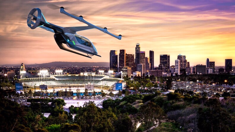 Uber partner, Embraer, showed its first electric vertical takeoff and landing vehicle. Developed with extensive input from potential urban air travelers about their desired experience, it's one of several designs Uber is considering for a flying version of its popular ride-hail service.