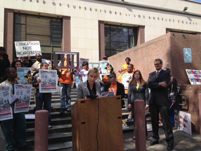 Kristina Ronnquist, a psychiatric intern in L.A.'s County jails, joined protesters outside the county building as the Board of Supervisors considered a $1.8 billion jail construction plan.