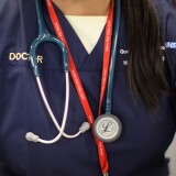BIRMINGHAM, ENGLAND - FEBRUARY 07:  A doctor at the Accident and Emergency department of the recently opened Birmingham Queen Elizabeth Hospital on February 7, 2011 in Birmingham, England. The new Queen Elizabeth Hospital accommodates 1,213 beds and 30 operating theatres. The super hospital has a 100-bed intensive care unit - the largest in Europe - and the largest single floor critical care unit in the world.  (Photo by Christopher Furlong/Getty Images)