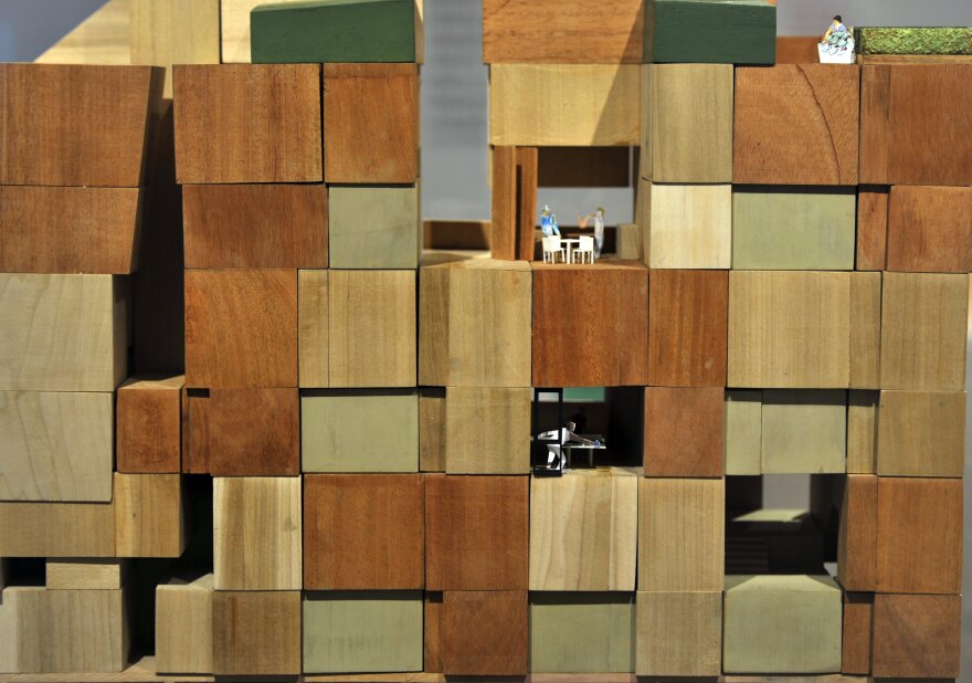 A partial cutaway model of residential spaces called ' New York GoHome' at the Museum of the City of New York January 23, 2013 during the opening of a new exhibition, 'Making Room: New Housing for New Yorkers'. New York City mayor Michael Bloomberg unveiled yesterday New York City’s first “micro-unit” building will have apartments as small as 250 square feet. AFP PHOTO / TIMOTHY A. CLARY (Photo credit should read TIMOTHY A. CLARY/AFP/Getty Images)