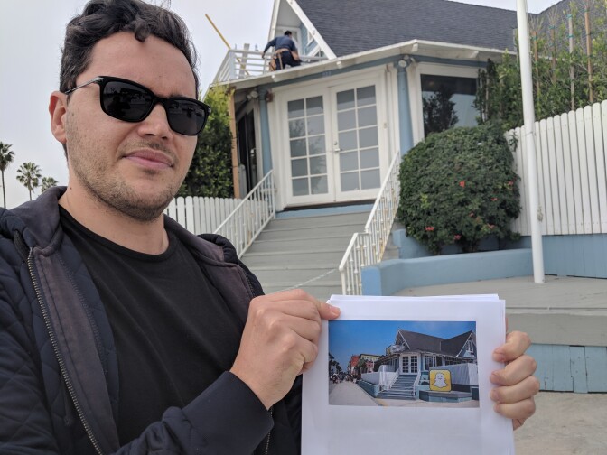 Photographer Robert Lang shows a picture he took of Snapchat's former HQ, a bungalow on the Venice boardwalk. Today, the same place is shuttered with no signs that Snapchat ever used this as an office.
