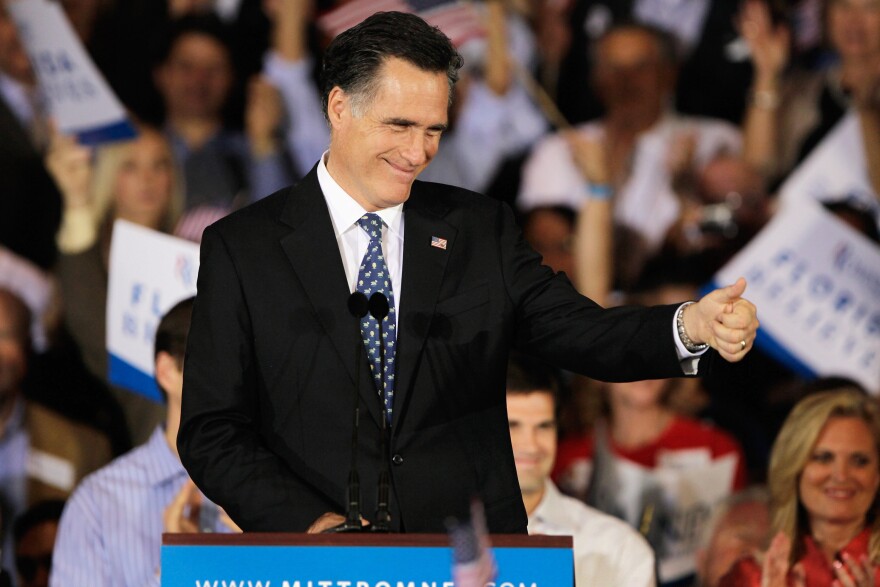 TAMPA, FL - JANUARY 31:  Republican presidential candidate, former Massachusetts Gov. Mitt Romney gestures during his Florida primary night party on January 31, 2012 in Tampa, Florida. According to early results Romney defeated former Speaker of the House Newt Gingrich, former U.S. Sen. Rick Santorum and U.S. Rep. Ron Paul (R-TX) to win Florida's primary.   (Photo by Joe Raedle/Getty Images)