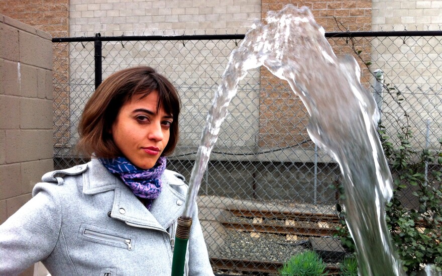 Off-Ramp commentator Taylor Orci and the hose that proves there's no drought.