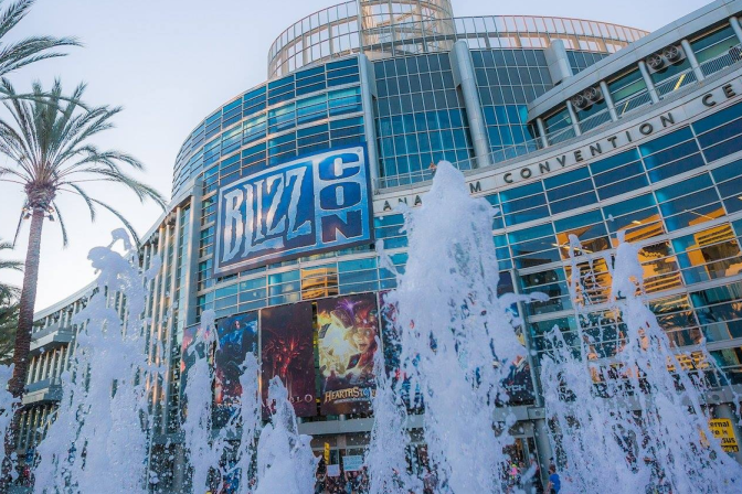 Exterior of the Anaheim Convention Center with water fountains in front with a marquee that reads BlizzCon.