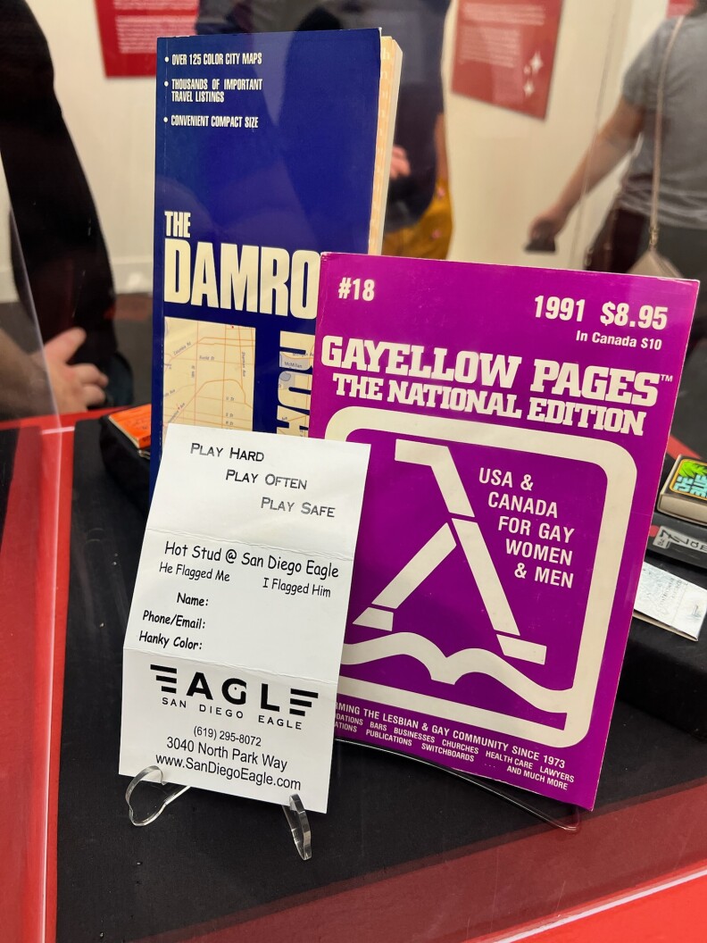 A display of gay travel guides, the Damron Address Book and the Gayellow Pages