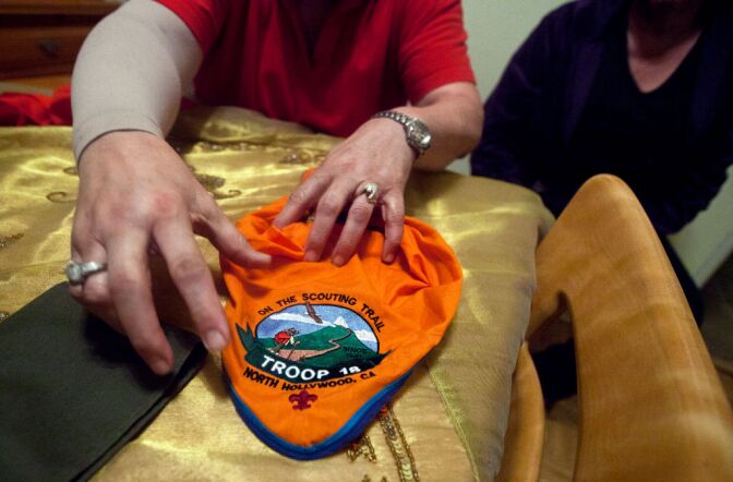 Cindy Sanchez holds her son's Eagle Scout bandanna for North Hollywood Troop 18.