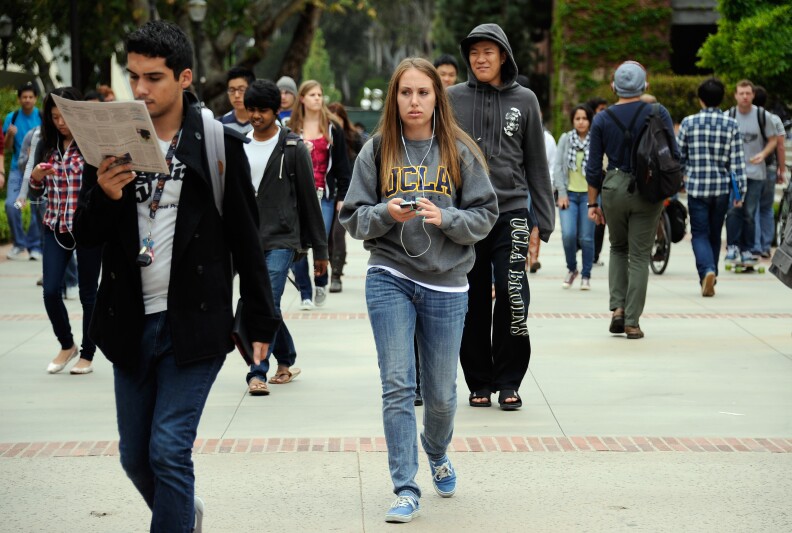 LOS ANGELES, CA - APRIL 23:  Students walk across the campus of UCLA on April 23, 2012 in Los Angeles, California. According to reports, half of recent college graduates with bachelor's degrees are finding themselves underemployed or jobless.  (Photo by Kevork Djansezian/Getty Images)