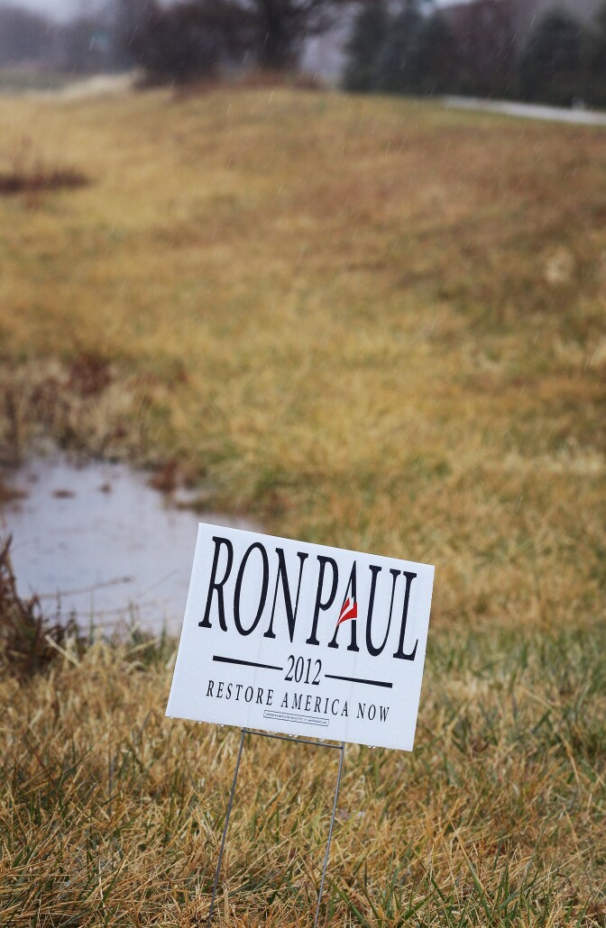DES MOINES, IA - DECEMBER 14:  Rain falls on a Ron Paul campaign sign on December 14, 2011 in Des Moines, Iowa. Contenders for the Republican presidential nomination are stepping up their efforts in Iowa in front of the state's January 3, caucus.  (Photo by Scott Olson/Getty Images)