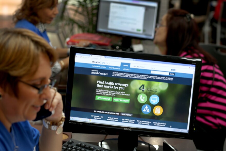 Mercy Cabrera, an insurance agent with Sunshine Life and Health Advisors, speaks on the phone as she helps a person with information about an insurance policy under the Affordable Care Act at the store setup in the Westland Mall on November 14, 2013 in Hialeah, Florida. As the insurance agents continue to help people purchase and understand the policies offered under the Affordable Care Act, U.S. President Barack Obama announced that Americans who have had their health insurance plans canceled because of the Affordable Care Act can keep those plans for another year if they wish to. 