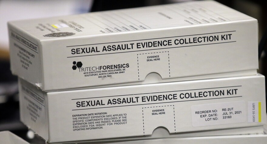 This Feb. 8, 2017, photo, sexual assault evidence collection kit are shown during committee meeting at the Utah State Capitol, in Salt Lake City. Utah crime lab officials are feeling optimistic as they work to speed up the time it takes to process sexual assault evidence kits, after lawmakers approved a measure last month that sends more than $1 million to go toward this effort.