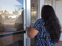 Carolina, who arrived 12 years ago on a tourist visa and overstayed, enters a community center to meet with a reporter. People who came to the U.S. legally on visas and and stayed after they expired are believed to make up more than 40 percent of the nation's unauthorized immigrant population. 