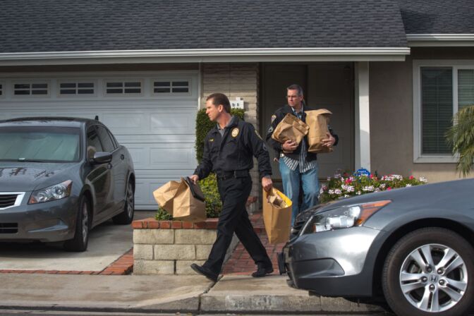 Police remove evidence from Christopher Jordan Dorner's residence in La Palma, Calif. on Feb. 8, 2013.