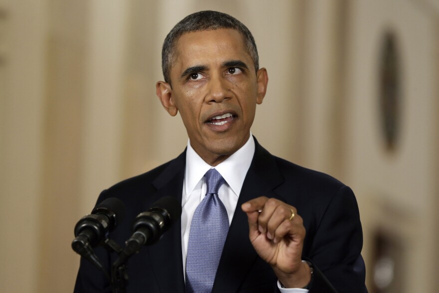 U.S. President Barack Obama addresses the nation in a live televised speech from the East Room of the White House on September 10, 2013 in Washington, DC. President Obama blended the threat of military action with the hope of a diplomatic solution as he works to strip Syria of its chemical weapons.  