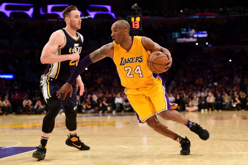 LOS ANGELES, CA - APRIL 13:  Kobe Bryant #24 of the Los Angeles Lakers drives on Gordon Hayward #20 of the Utah Jazz in the fourth quarter at Staples Center on April 13, 2016 in Los Angeles, California. NOTE TO USER: User expressly acknowledges and agrees that, by downloading and or using this photograph, User is consenting to the terms and conditions of the Getty Images License Agreement.  (Photo by Harry How/Getty Images)