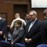 LOS ANGELES, CA - FEBRUARY 20:  Former Bell council members Luis Artiga, left, Teresa Jacobo, George Mirabal, George Cole and former Mayor Oscar Hernandez stand in respect of jury as closing arguments session breaks for lunch on February 20, 2013 in Los Angeles, California. Six former city officials are charged with misappropriating public funds and, if convicted, can spend 12 to 21 years in prison. (Photo by Irfan Khan-Pool/Getty Images)