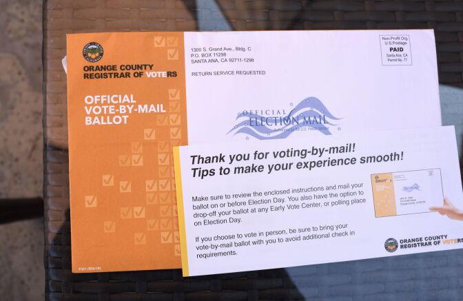 A mail-in ballot for the midterm elections is displayed in upscale Laguna Niguel in southern California's Orange County, October 14, 2018. - Amoukhteh, a registered Republican, is supporting a Democratic candidate for congress in her district. She says her turn away from the Republican Party was motivated by her distaste for what she sees as US President Donald Trump's misogyny and racism. (Photo by Robyn Beck / AFP)        (Photo credit should read ROBYN BECK/AFP/Getty Images)