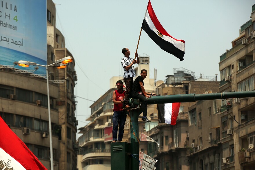 Hundreds of Egyptian protesters begin to gather in Tahrir Square as the deadline given by the military to Egyptian President Mohammed Morsi approaches on July 3, 2013 in Cairo, Egypt. The president gave a defiant speech last night and vowed to stay in power despite the military threats. As unrest spreads throughout the country, at least 23 people were killed in Cairo on Tuesday and over 200 others were injured.