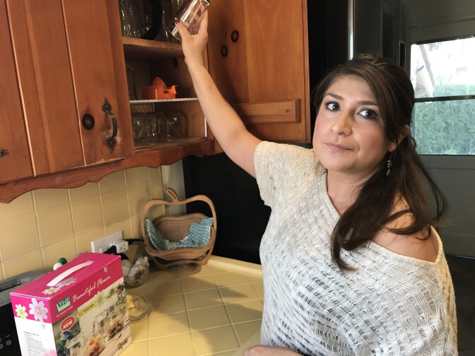 Altadena resident Rosa Castro stands to see a big increase in her taxes due to changing rules around itemized deductions, Dec. 27, 2017.  