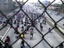Bikers block traffic on Interstate 10 for a marriage proposal Sunday, Jan. 27, 2013.