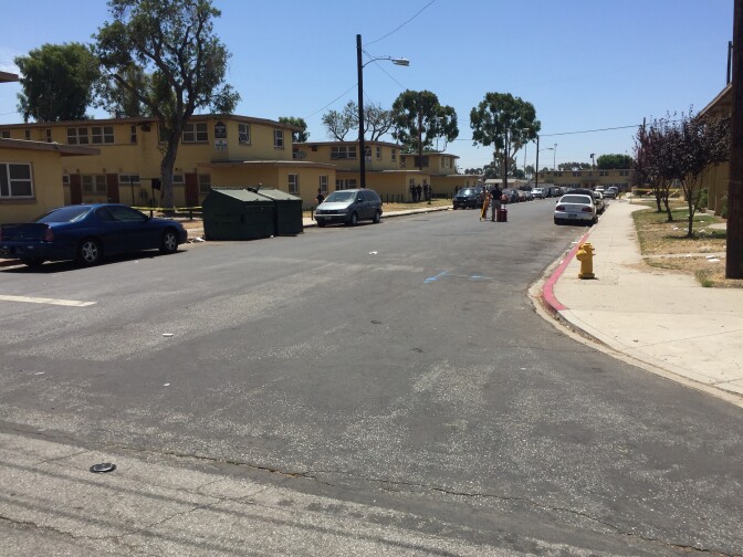 The shooting of a young black man by the LAPD Monday night occurred at the end of this street in the Nickerson Gardens Housing Project, one of the largest public housing projects in the country. Police say the man shot at them.