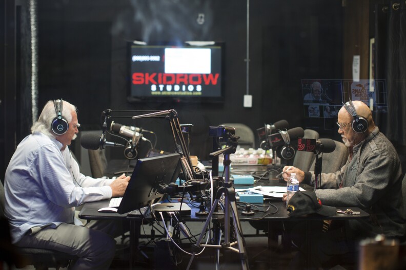 Bob Rosebrock, left, hosts the first-ever episode of Veterans Revolution Radio with guest Dave Culmer on Wednesday evening, Feb. 25, 2015 at SkidRow Studios.