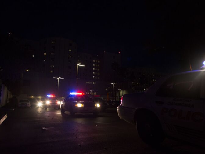 Police cars leave Loma Linda Hospital on February 12, 2013.