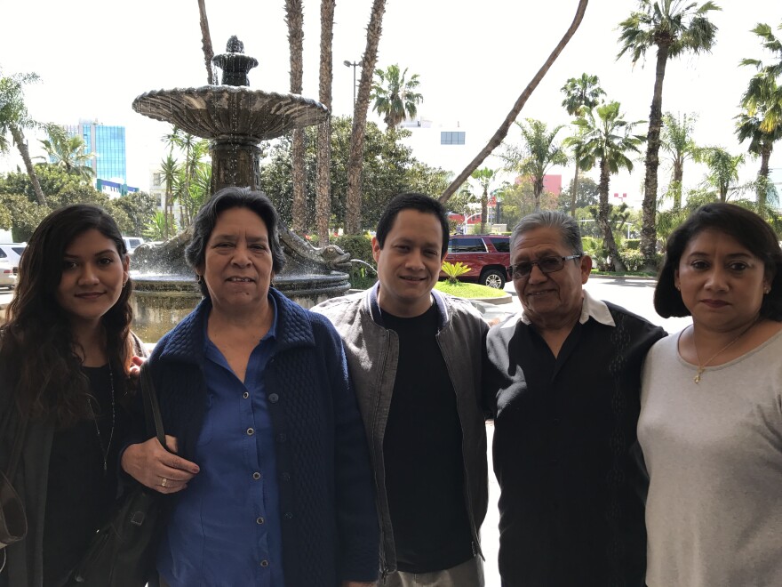 Jaime Ponce is flanked by his mother and father and two cousins in Tijuana. Loyola Law School's Project for the Innocent secured his release after 19 years in prison for a shooting he says he did not commit.