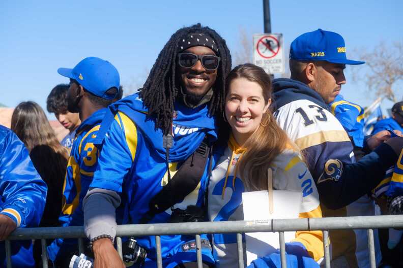 Two Rams fans celebrating at the Championship Parade and Rally