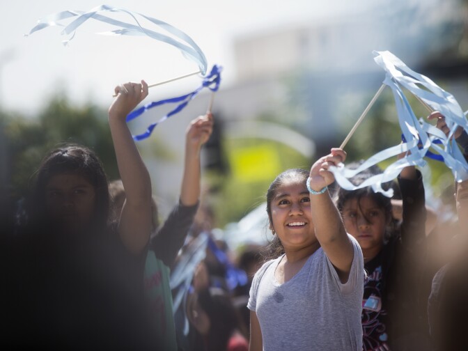 Students from Lankershim Elementary in North Hollywood take part in setting the Guinness World Records Title for the largest ribbon dance on Thursday, April 9, 2015 at The Music Center Plaza. 