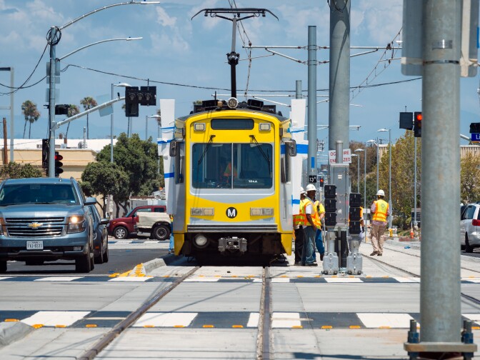 FILE: An Expo Line test train runs through downtown Santa Monica. The train is expected to open to the public in spring 2016.
