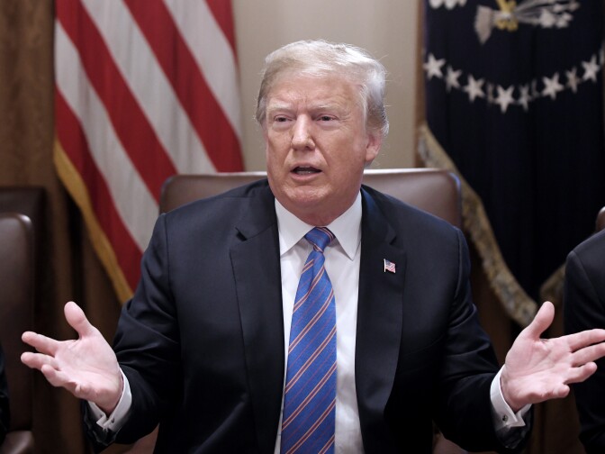 WASHINGTON, DC - JULY 18: (AFP OUT)  U.S. President Donald Trump speaks during a cabinet meeting with U.S. President Donald Trump in the Cabinet Room of the White House, July 18, 2018 in Washington, DC. (Photo by Olivier Douliery-Pool/Getty Images)