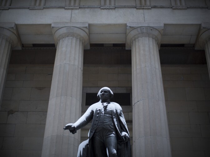 NEW YORK, NY - FEBRUARY 09:  A statue of George Washington at Federal Hall is covered in snow following a major winter storm on February 9, 2013 in New York City. New York City and much of the Northeast received a foot or more of snow overnight. Heavy snow warnings are in effect from New Jersey through southern Maine. (Photo by Andrew Kelly/Getty Images)
