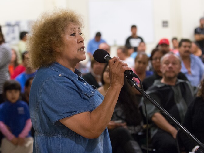 Lidia Hernandez shares her experience with police as a street vendor during a public hearing on the future of street vending in Los Angeles held on Thursday, May 28, at Boyle Heights City Hall.