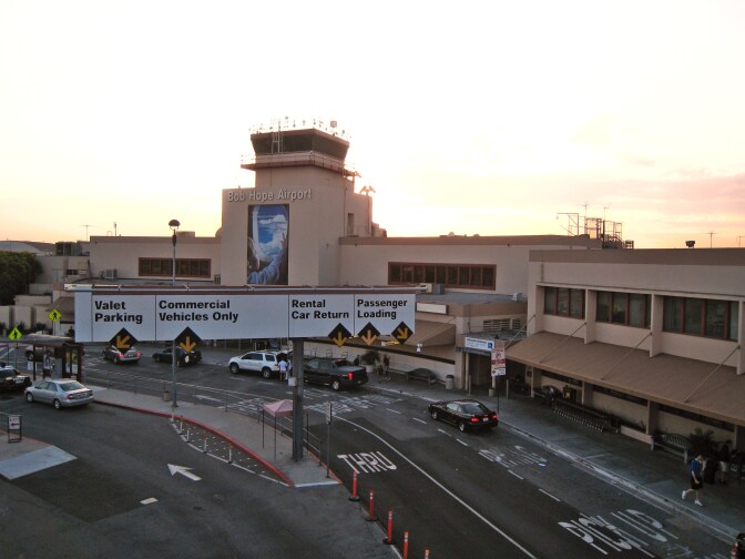 The sun setting behind the Hollywood Burbank Airport