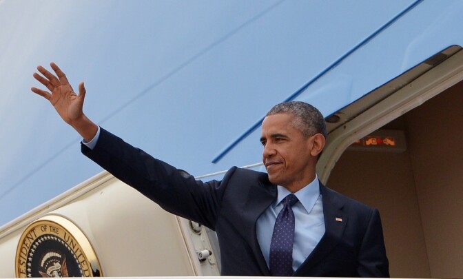 President Obama waves from Air Force One before departing from Andrews Air Force Base in Maryland on Wednesday.