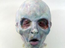 A mask from the show 'The X-Files.'