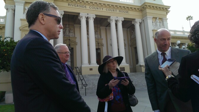 Roy Goldberg (left) and Andrew Cronthall speak with reporters outside the Riverside County courthouse after a status update on the Ontario Airport on Wednesday, February 5, 2014.
